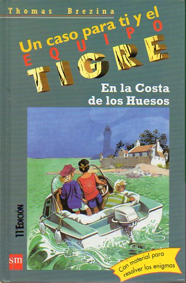 UN CASO PARA TI Y EL EQUIPO TIGRE. 5. EN LA COSTA DE LOS HUESOS. Ilustraciones de Werner Heymann. Con material para resolver los enigmas. 11 ed.